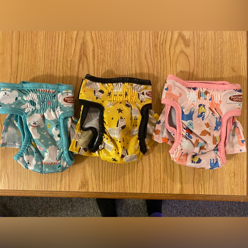Never used cute doggy diapers!